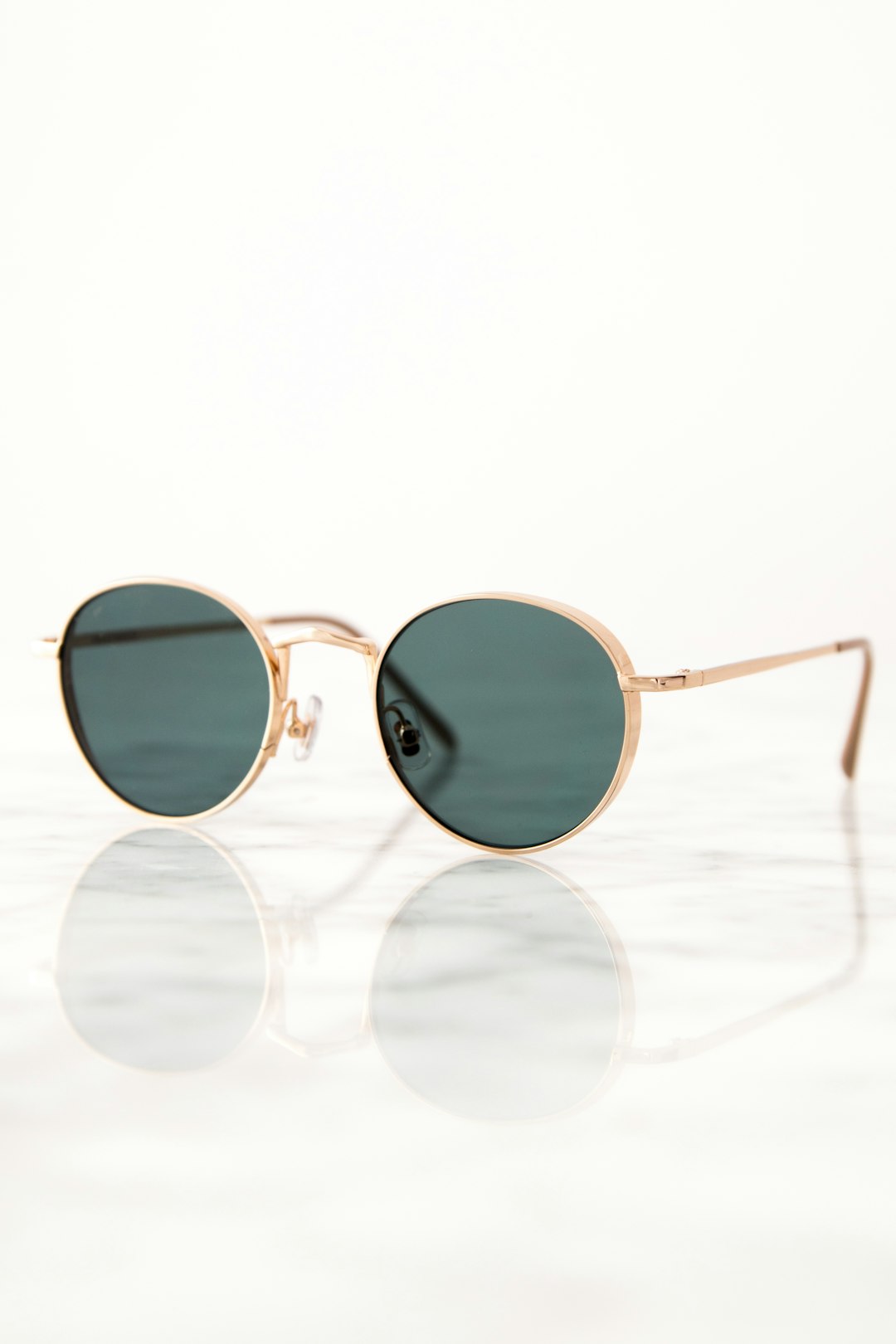 Oval sunglasses on a woman outdoors