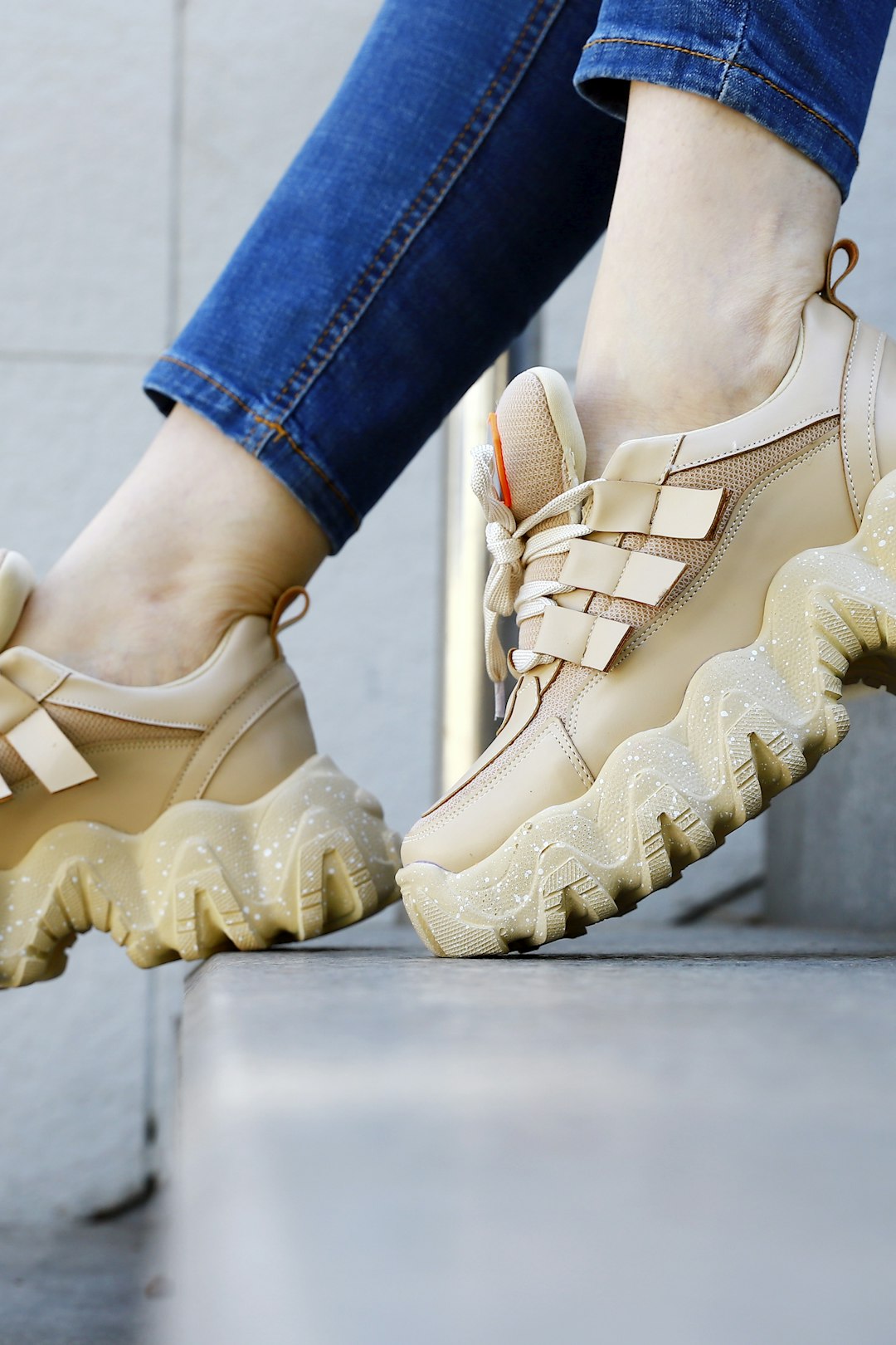 Chunky dad sneakers styled with an outfit